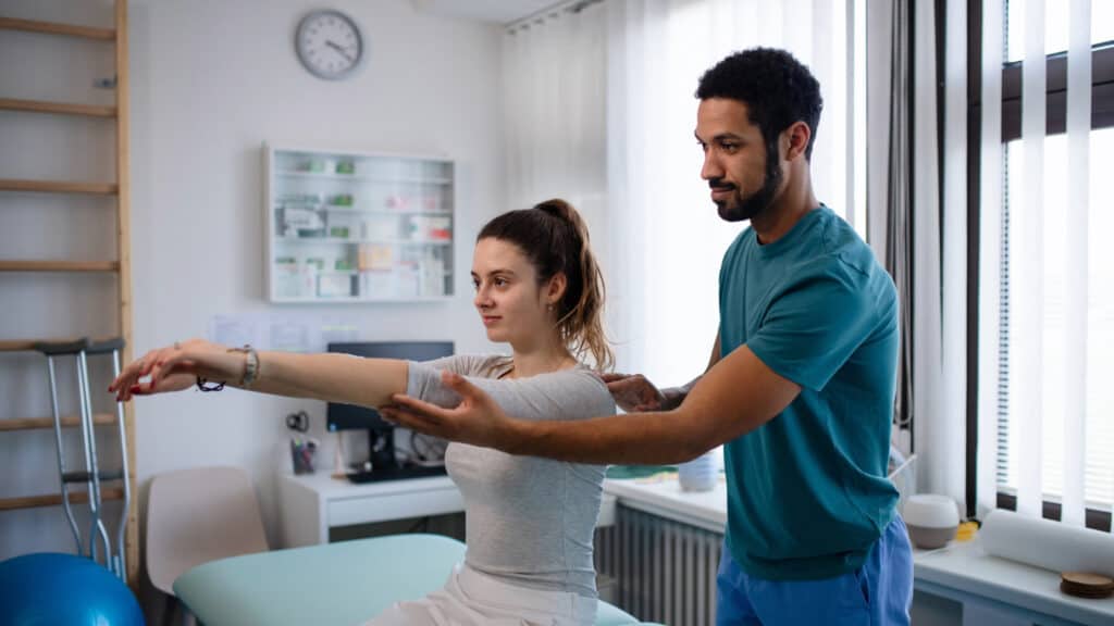 female receiving physiotherapy treatment